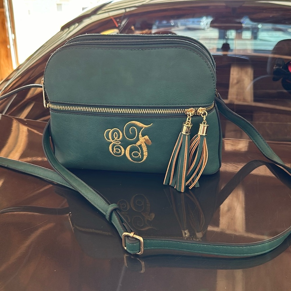 Jade/forest green cute purse with EF initials.